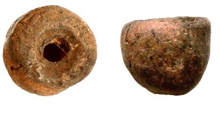Plain spindle whorl of convex conical shape, height //cm, found during the Scavi Kleibrink 1991-2004 on the Timpone della Motta, 8th century BC, National Archaeological Museum, Sibari. Plain spindle whorl of convex conical shape, height //cm, found during the Scavi Kleibrink 1991-2004 on the Timpone della Motta, 8th century BC, National Archaeological Museum, Sibari.