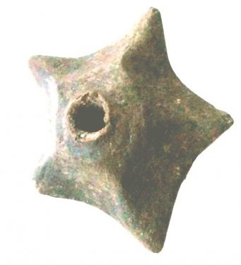 Star-shaped spindle whorl, found during the Scavi Kleibrink 1991-2004 on the Timpone della Motta, 8th century BC, now in the National Archaeological Museum, Sibari. Star-shaped spindle whorl, found during the Scavi Kleibrink 1991-2004 on the Timpone della Motta, 8th century BC, now in the National Archaeological Museum, Sibari.