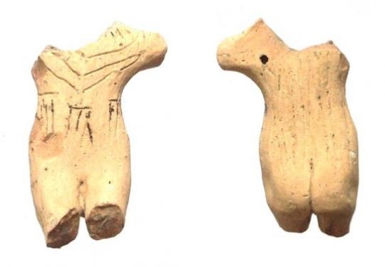 Terracotta figurine of a seated goddess with uplifted arms, produced for the sanctuary on the Timpone della Motta, height 8.3 cm, early 7th c. BC. From the Excavations Stoop, found underneath Temple II, Temple Plateau of the Timpone della Motta, National Museum of the Sibaritide, inv. no. 64707. Terracotta figurine of a seated goddess with uplifted arms, produced for the sanctuary on the Timpone della Motta, height 8.3 cm, early 7th c. BC. From the Excavations Stoop, found underneath Temple II, Temple Plateau of the Timpone della Motta, National Museum of the Sibaritide, inv. no. 64707.